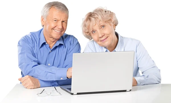 Happy senior couple with laptop — Stock Photo, Image