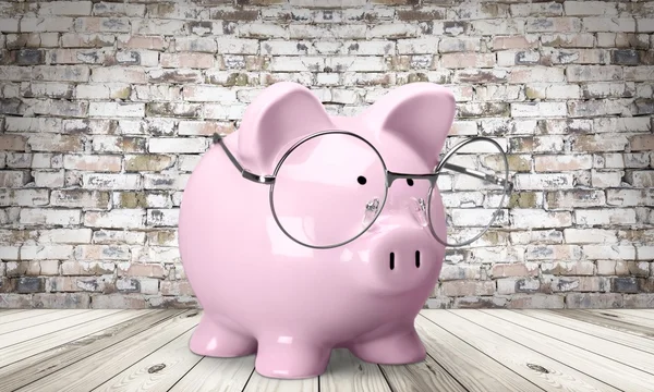 Pink piggy bank with spectacles — Stock Photo, Image