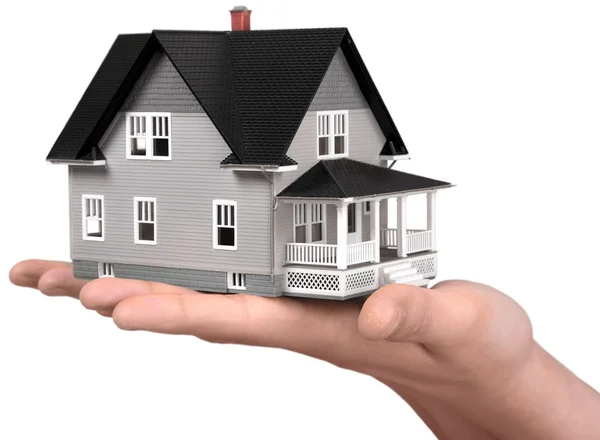 Hand holding house model — Stock Photo, Image