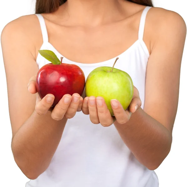 Mujer sosteniendo dos manzanas — Foto de Stock