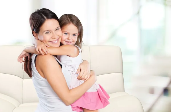 Mother and daughter hugging — Stock Photo, Image