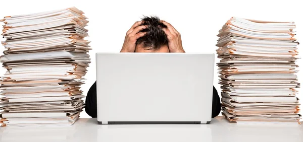 Young businessman with stack of papers — Stock Photo, Image