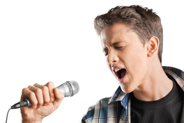 Молодий хлопчик з мікрофоном — стокове фото