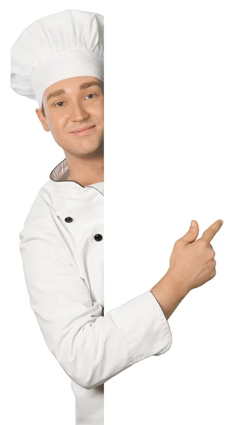 Kocken visar tecken billboard i uniform — Stockfoto