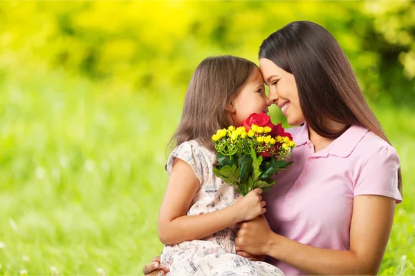 Mother and daughter hugging — Stock Photo, Image