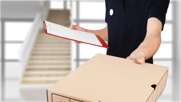 Man delivering box package — Stock Photo, Image