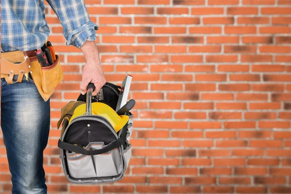 Worker with a tool belt