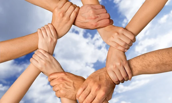 Family holding their hands together — Stock Photo, Image