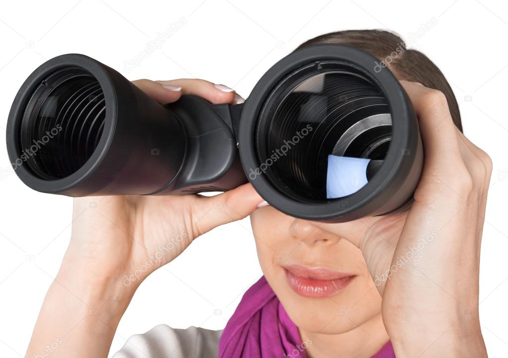 Girl looking into binoculars