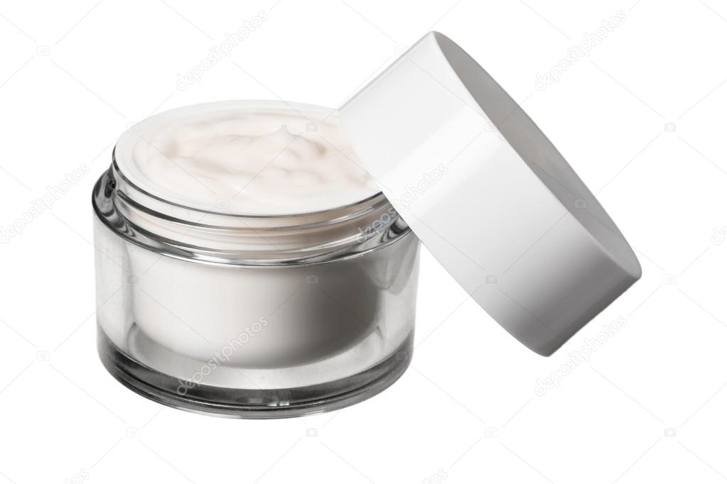 cosmetic cream on table