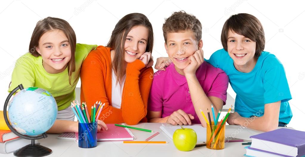 children at school studying subject