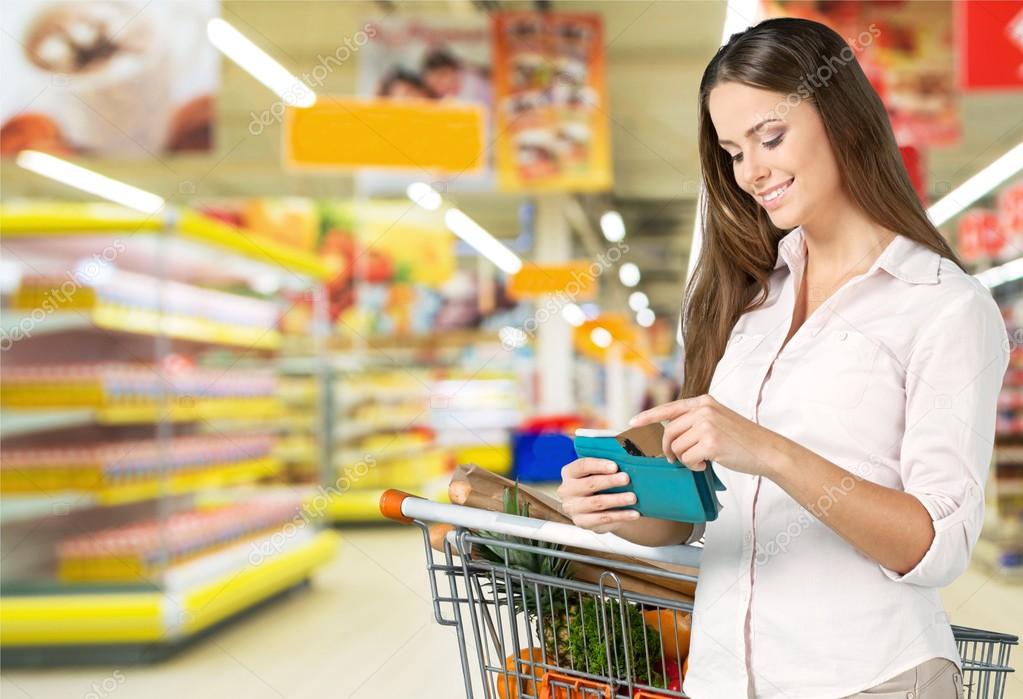 Woman with cart shopping