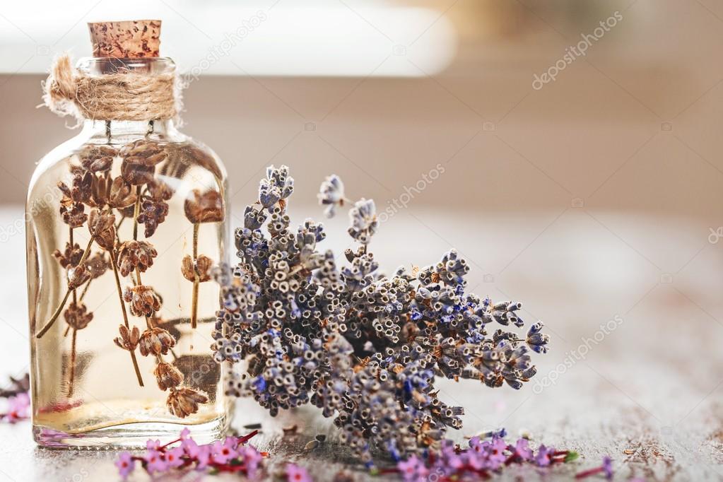 Lavender flowers and glass bottle 
