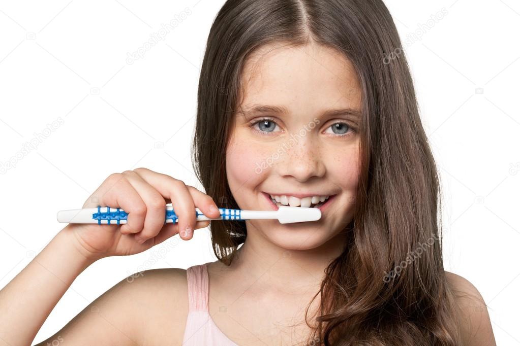 Little girl brushing teeth