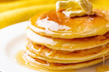 Tasty pancakes with butter clipart