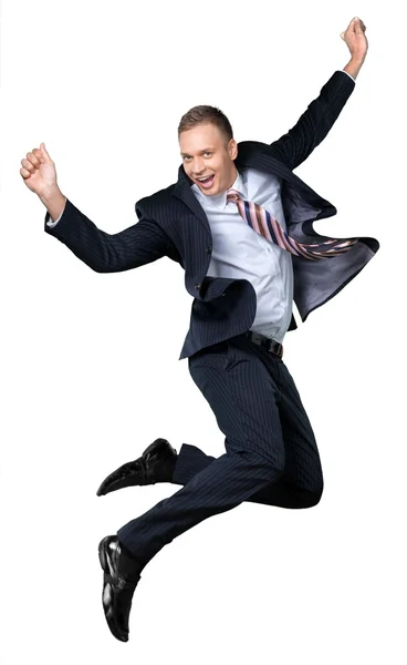 Homem de negócios bonito pulando — Fotografia de Stock