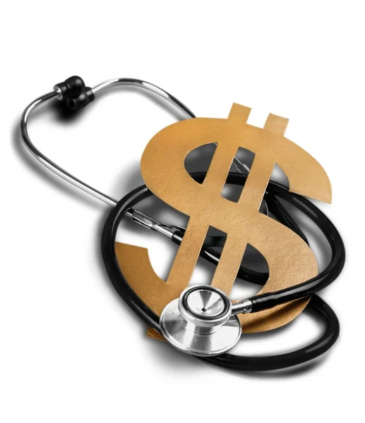 Golden dollar sign and stethoscope — Stock Photo, Image