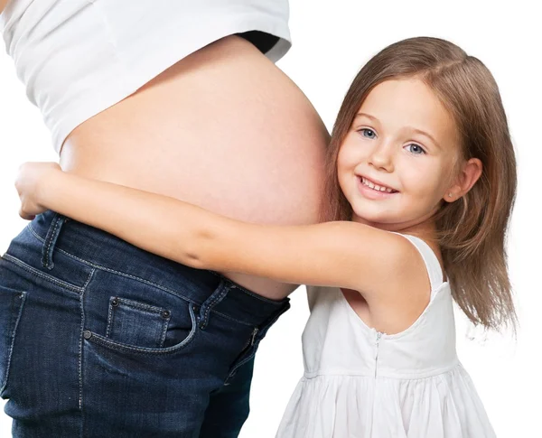 Beautiful pregnant woman with her daughter — Stock Photo, Image