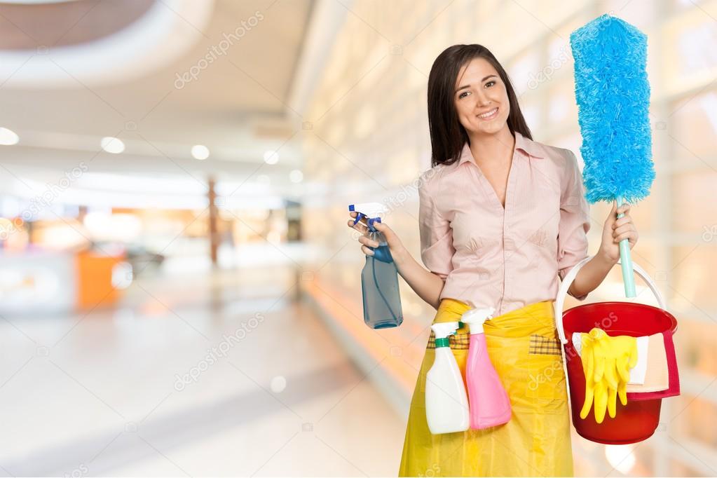 Young Woman with Cleaning products