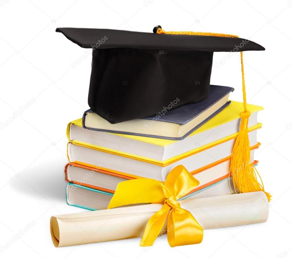 Graduation mortarboard on stack of books