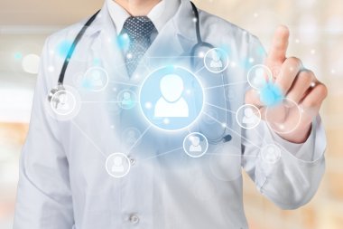 Tıbbi simge ve genç doktor 