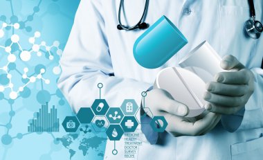 Tıbbi simge ve genç doktor 