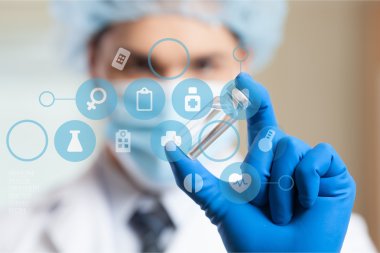 Tıbbi simge ve genç doktor 