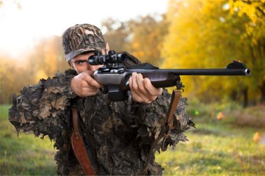 Male Hunter with Rifle  clipart