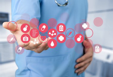 Tıbbi simge ve genç doktor 