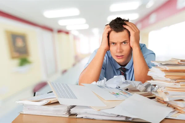 Businessman with many business papers — Stock Photo, Image