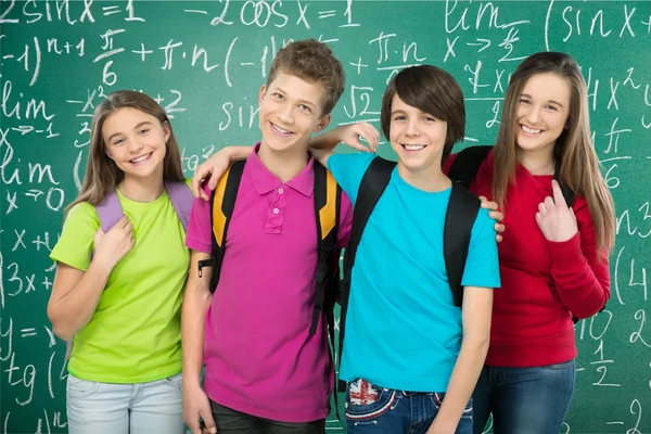 Niños de escuela amigables con mochilas —  Fotos de Stock