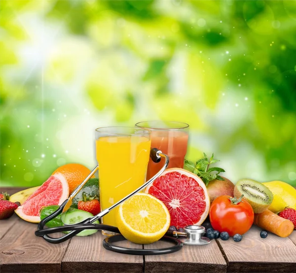 Tasty fruits  and juice with vitamins — Stock Photo, Image