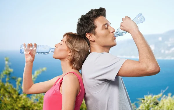 Pareja de agua potable —  Fotos de Stock