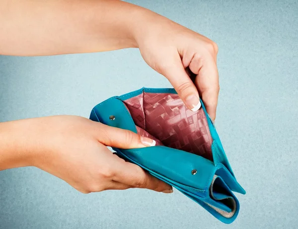 Female hands with an empty wallet — Stock Photo, Image