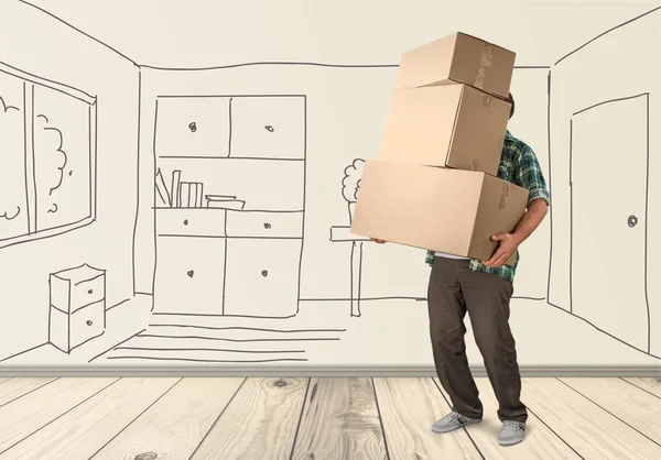 Lots of cardboard boxes and man — Stock Photo, Image