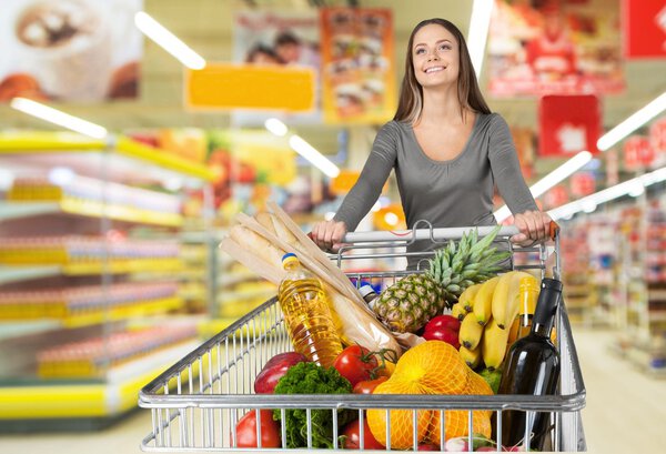 Woman with cart shopping