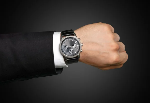 Geschäftsmann zeigt auf Handuhr — Stockfoto