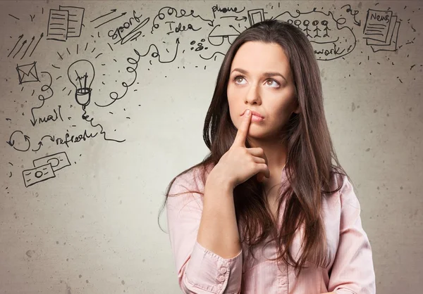 Pretty Young female student thinking — Stock Photo, Image