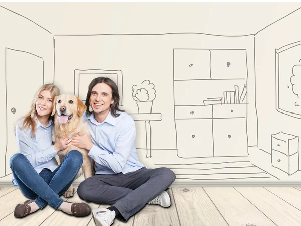 couple in new apartment with  dog