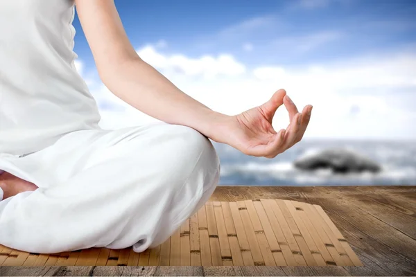 calm woman doing yoga exercise