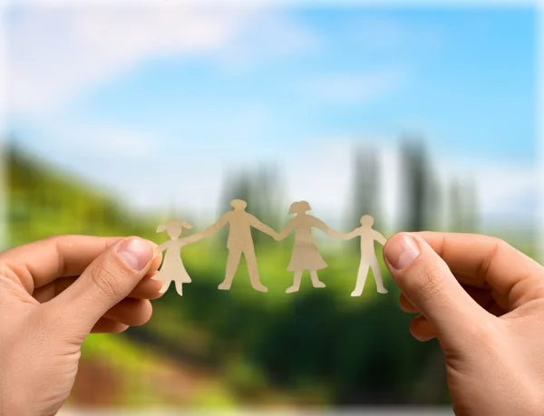 Hands showing paper  family — Stock Photo, Image