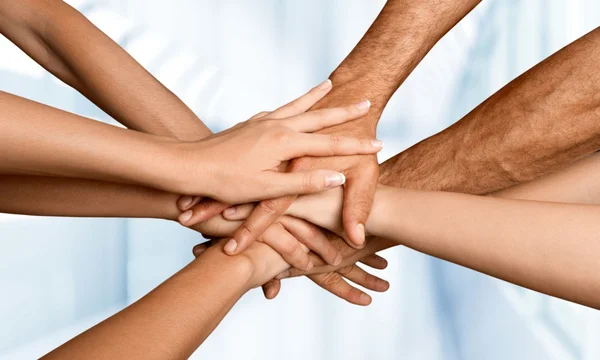 Family holding their hands together — Stock Photo, Image