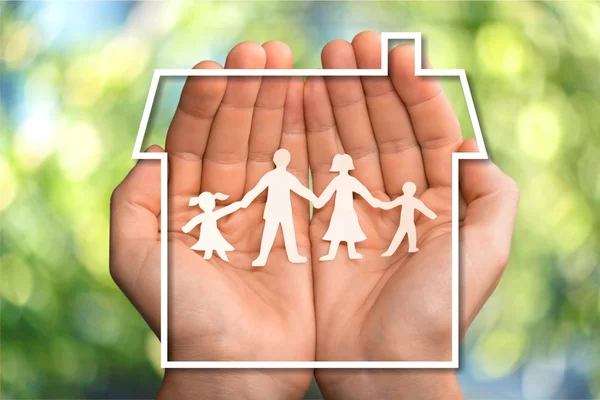 Hands showing paper  family — Stock Photo, Image