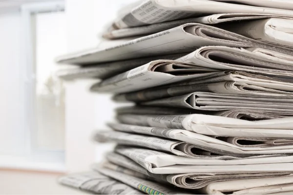 Pile of newspapers on  background — Stock Photo, Image