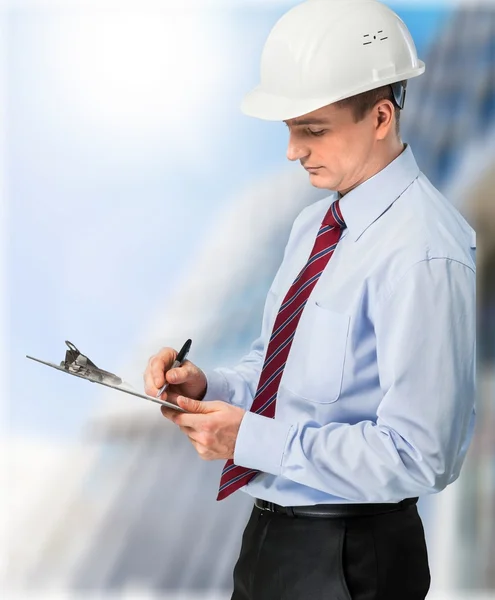 Engineer taking a note. — Stock Photo, Image