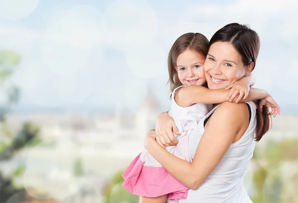 Mother and daughter hugging — Stock Photo, Image