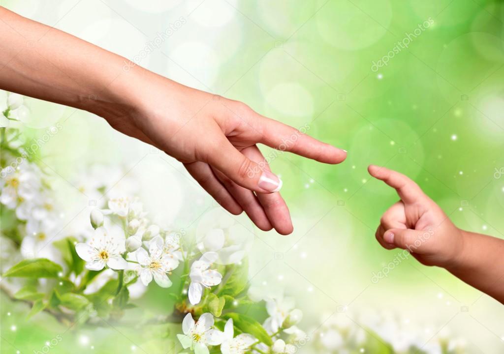 Download Mother and child reaching hands — Stock Photo ...