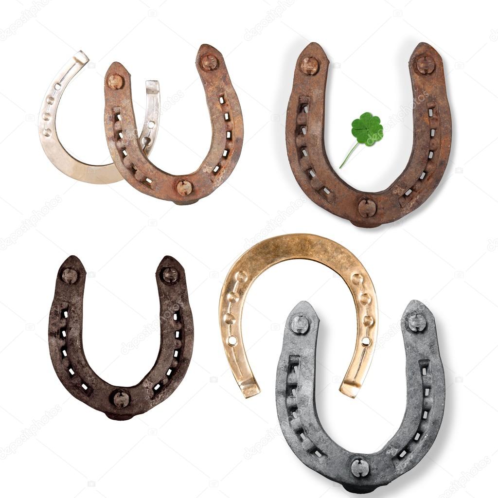 old rusty horseshoes on background