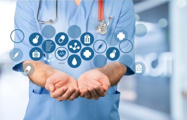 Tıbbi simge ve genç doktor 