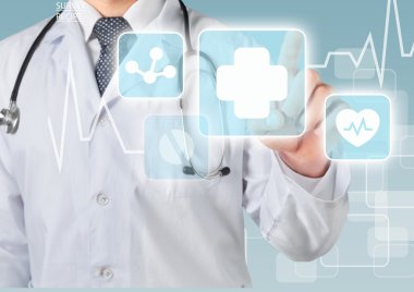 Tıbbi simge ve genç doktor 